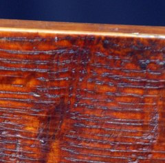 Faint Gustav Stickley branded signature at the back of the back splash.  